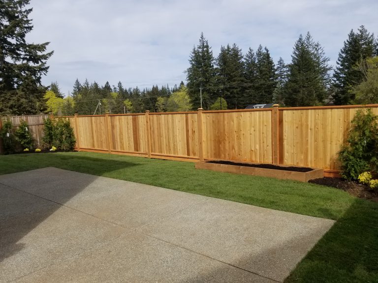 Cedar privacy fencing installed by Island Green Services — Vancouver Island
