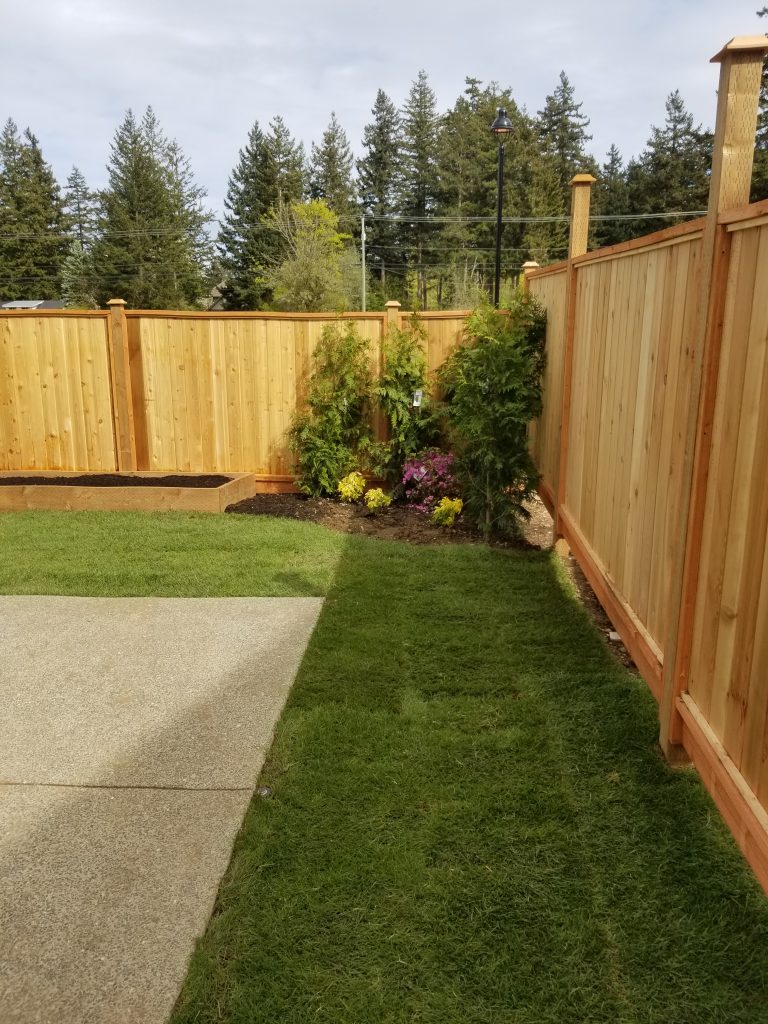 Modern metal panel fencing Vancouver Island